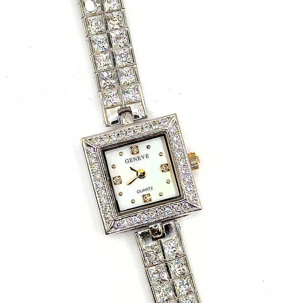 One lady's 18K yellow (rhodium plated) gold Geneve wrist watch, measuring approx
